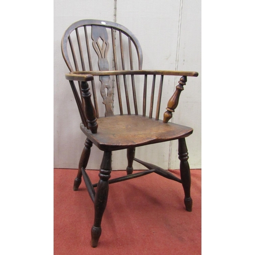 2442 - A Georgian Windsor ashwood stickback elbow chair on turned supports