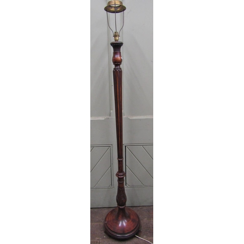 2444 - A late Edwardian lamp standard of full height inverted tapered and fluted column and disc base