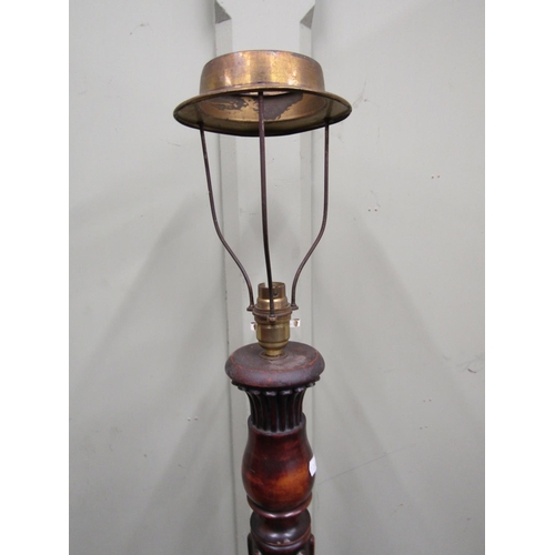 2444 - A late Edwardian lamp standard of full height inverted tapered and fluted column and disc base