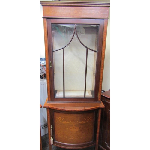 2452 - A well matched pair of inlaid Edwardian mahogany display cabinets each enclosed by a single glazed p... 