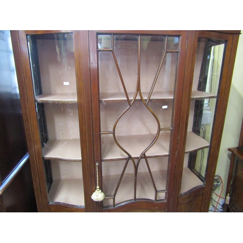 2453 - Inlaid Edwardian mahogany display cabinet of full height enclosed by three quarter length glazed pan... 