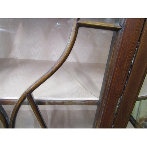 2453 - Inlaid Edwardian mahogany display cabinet of full height enclosed by three quarter length glazed pan... 