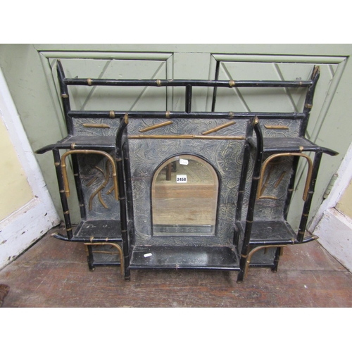 2458 - A Victorian aesthetic period overmantle mirror in bamboo with embossed floral back incorporating an ... 