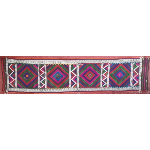 2474 - An old Sunni kilim runner, brightly coloured panelled diamond pattern. 288cm x 69cm.