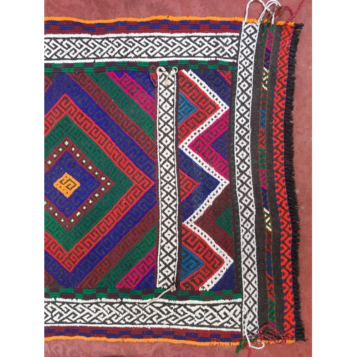 2474 - An old Sunni kilim runner, brightly coloured panelled diamond pattern. 288cm x 69cm.