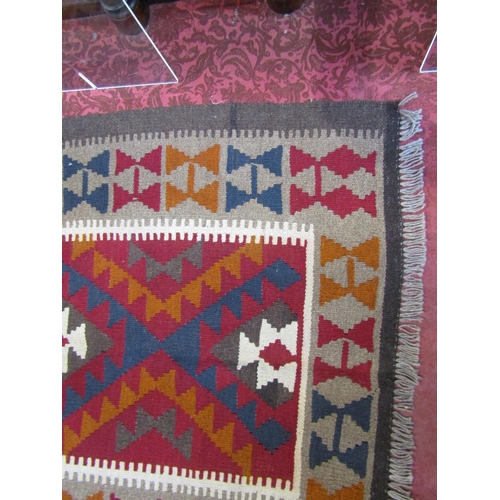 2475 - A Maimana kilim, with a colourful zigzag design. 153cm x 100cm