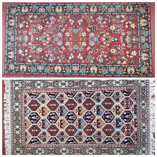 2491 - A modern Middle Eastern design carpet with an all over floral pattern. 163cm x82cm approx and anothe... 