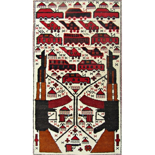 2493 - A late 20th century Afghan War Carpet featuring two AK 47 rifles, pistols and helicopters. 120cm x 8... 