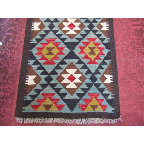 2529 - A Maimana kilim runner with geometric diamond pattern. 206cm x 56cm