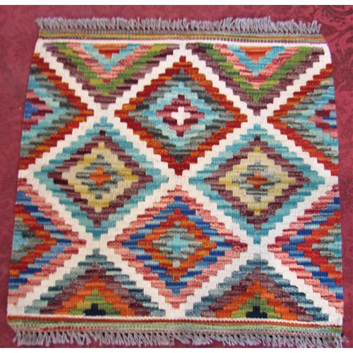 2532 - A Choi kilim with a multi coloured diamond pattern 123cm x 82cm and a small kilim mat similar 50cm 5... 