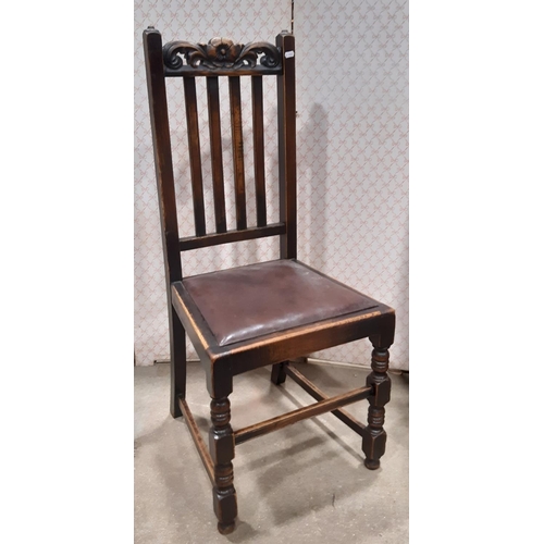 2031 - A set of six oak carolean style dining chairs (4 & 2) with carved and pierced cresting rails, uphols... 