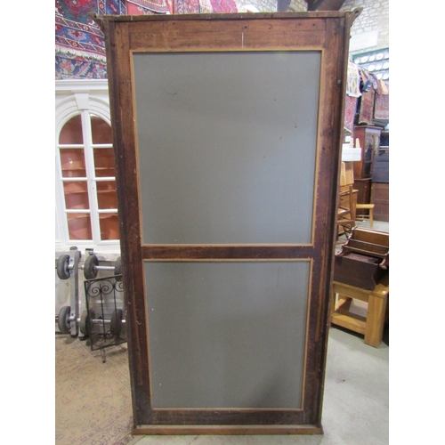 2135 - A good quality floorstanding shop display side cabinet with arched glazed panelled surround, moulded... 