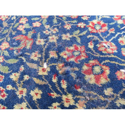 2460 - A large country house size carpet with 3 central medallions on a blue busy floral and bird pattern g... 