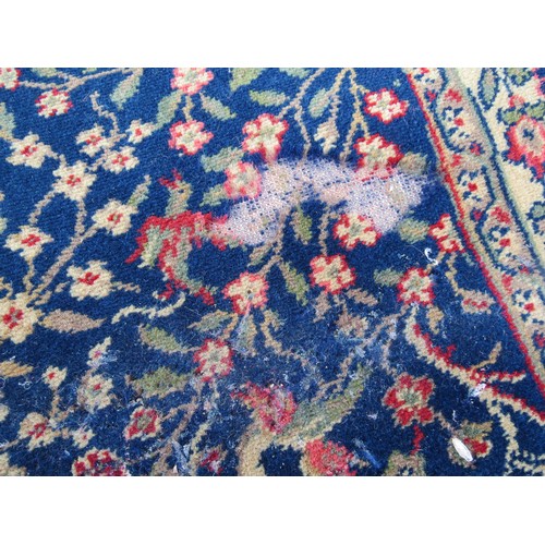 2460 - A large country house size carpet with 3 central medallions on a blue busy floral and bird pattern g... 