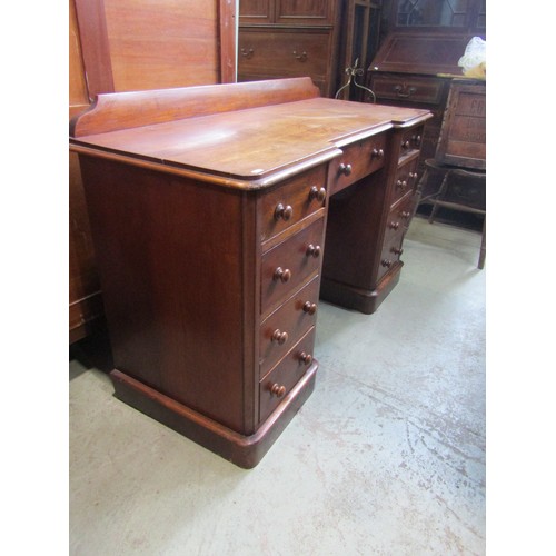 2181a - A Victorian mahogany kneehole twin pedestal desk/dressing table with shallow inverted breakfront and... 