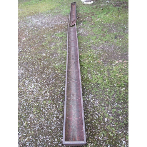 2007 - An unusual extremely long vintage cast iron pig feeding trough with simple open rung divisions, stam... 