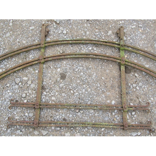 2014 - A 19th century iron door arch with hooped rails with simple scrolled ends 250 cm wide x 135 cm high ... 