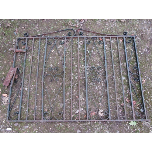 2022 - A low ironwork entrance gate with simple scroll work detail, 140 cm wide x 102 cm high, together wit... 