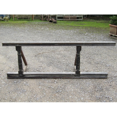 2048 - A reclaimed chapel altar rail raised on turned gun barrel supports with later additional bracing, 21... 
