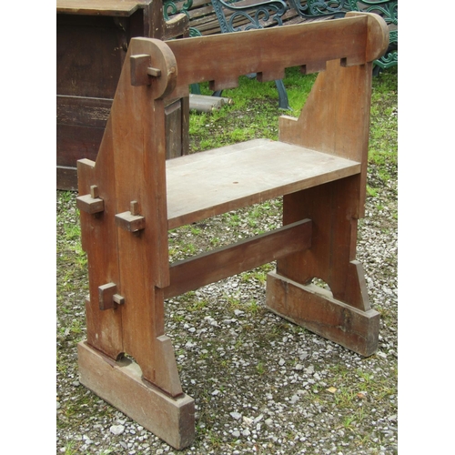 2049 - An ecclesiastical chair with wide seat within a pegged framed 82 cm wide