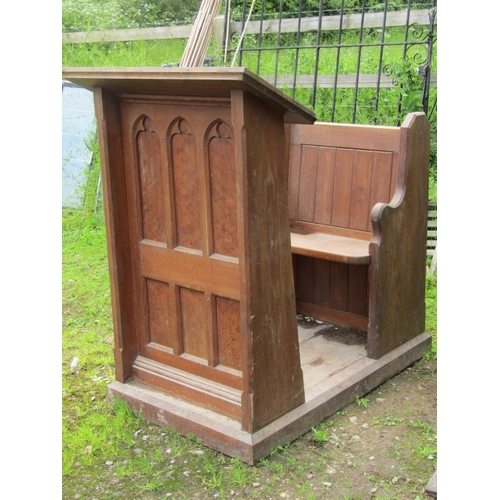2050 - A pitch pine church lectern with combined seat and platform base with chamfered framework and gothic... 