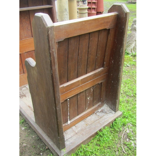 2050 - A pitch pine church lectern with combined seat and platform base with chamfered framework and gothic... 