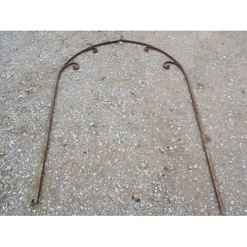 2051 - An old probably 19th century two sectional wrought iron arch of simple scroll work and partial rope ... 