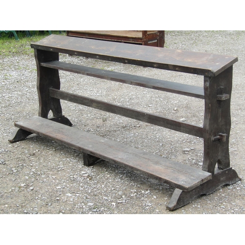 2054 - A stained pitch pine chapel prayer kneeling rail with pegged frame and sledge supports, 192 cm long ... 
