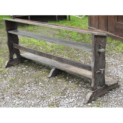 2057 - A stained pitch pine chapel prayer kneeling rail with pegged frame and sledge supports, 192 cm long ... 