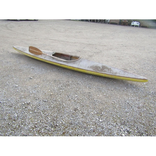 2062 - A fibreglass canoe and paddle with applied label Moonraker built from a kit supplied by Jenkins & La... 