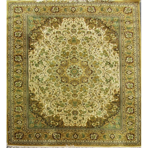 2777 - A large Belgian made Louis de Poortere Persian style  carpet with an all over floral pattern on a ye... 