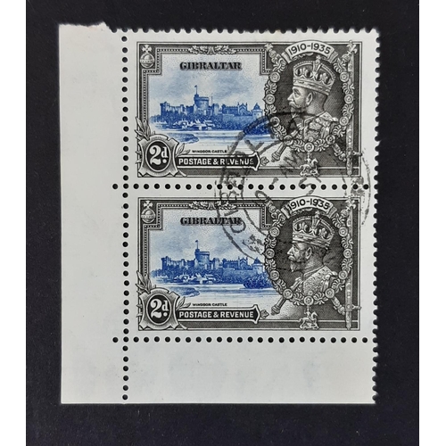 15 - Gibraltar 1935 Silver Jubilee SG 114/114a VFU, lower left hand corner pair, upper stamp showing the ... 