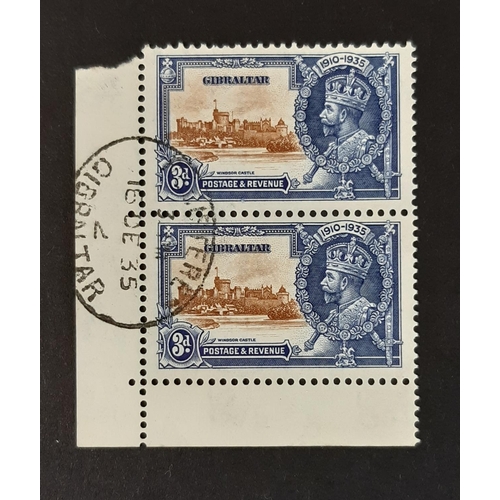 16 - Gibraltar 1935 Silver Jubilee SG 115/115a VFU, lower left hand corner pair, upper stamp showing the ... 