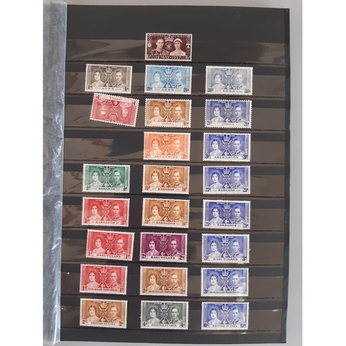 3 - A large accumulation of Mint GB Commonwealth stamps in four bags and on stock pages including 1937 C... 