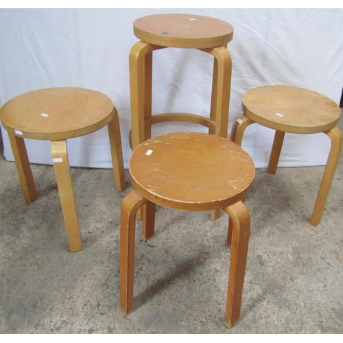 272 - ALVAR AALTO FOR ARTEK: A COLLECTION OF FOUR STOOLS, including ‘Stool 60’ and ‘Stool 64’ (4)