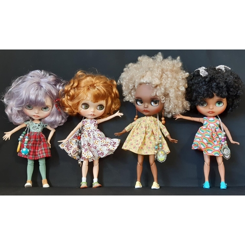 593 - Four customised Blythe dolls by Hasbro/Tomy; all are 'Neo' type with 2006 doll mould, jointed limbs,... 