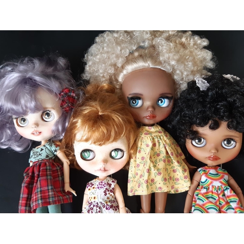 593 - Four customised Blythe dolls by Hasbro/Tomy; all are 'Neo' type with 2006 doll mould, jointed limbs,... 