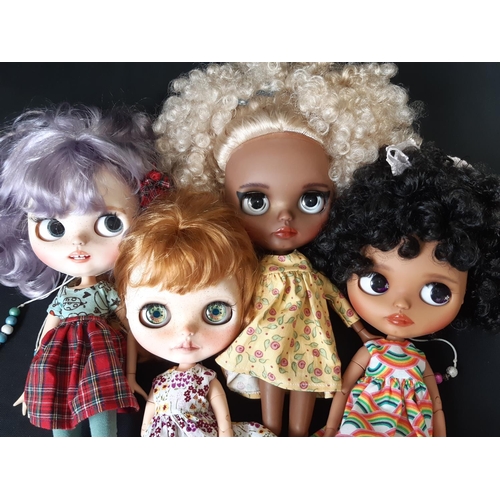 593 - Four customised Blythe dolls by Hasbro/Tomy; all are 'Neo' type with 2006 doll mould, jointed limbs,... 