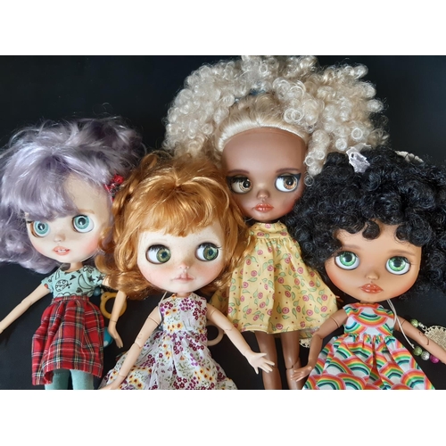 593 - Four customised Blythe dolls by Hasbro/Tomy; all are 'Neo' type with 2006 doll mould, jointed limbs,... 