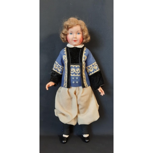 591 - 'Nicaput' doll, circa 1930's by König & Wernicke with blue closing eyes and 5 piece  body wearing a ... 