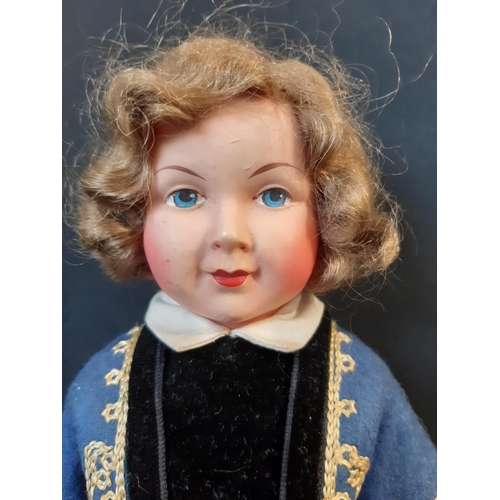 591 - 'Nicaput' doll, circa 1930's by König & Wernicke with blue closing eyes and 5 piece  body wearing a ... 