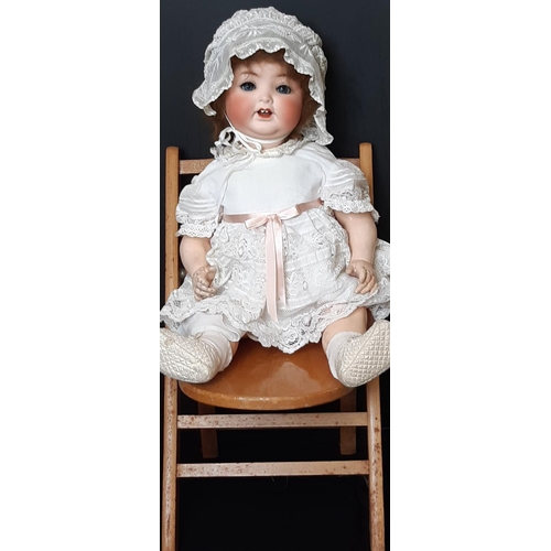 597 - Collection of antique and reproduction dolls and accessories including a large bisque head character... 