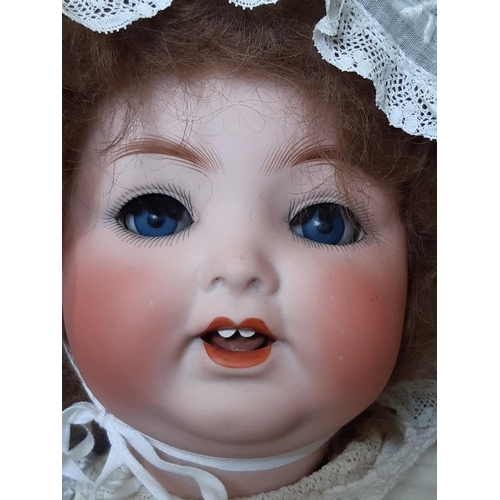 597 - Collection of antique and reproduction dolls and accessories including a large bisque head character... 