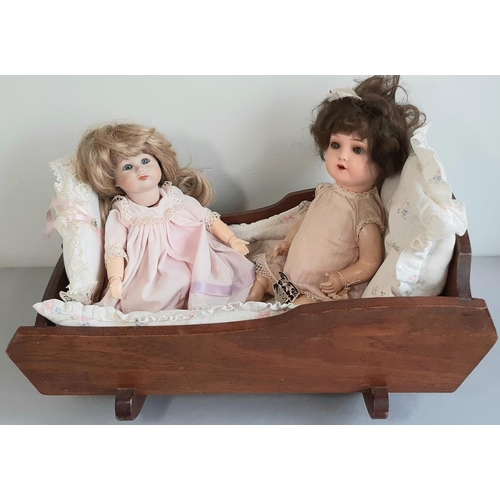 597 - Collection of antique and reproduction dolls and accessories including a large bisque head character... 