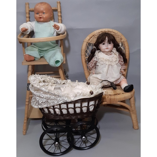 597 - Collection of antique and reproduction dolls and accessories including a large bisque head character... 