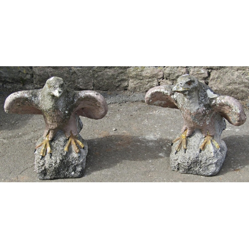 1074 - A pair of weathered partially painted cast composition stone garden ornaments/pier cap finials in th... 