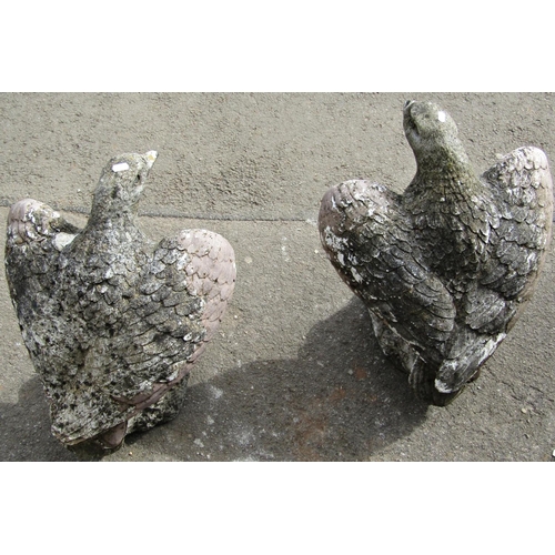 1074 - A pair of weathered partially painted cast composition stone garden ornaments/pier cap finials in th... 