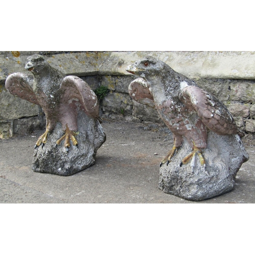 1074 - A pair of weathered partially painted cast composition stone garden ornaments/pier cap finials in th... 