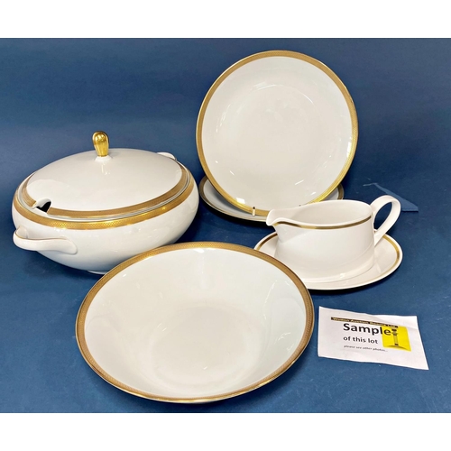 123 - A collection of German dinnerware - Bareuther Waldassen white with gilded borders comprising graduat... 