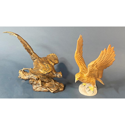 29 - Beswick matt glazed figure of a golden eagle and a further Beswick figure glazed showing a cock phea... 